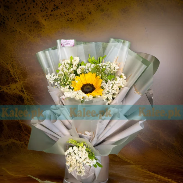 A stylish bouquet featuring statice and imported sunflowers.