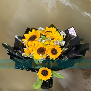 A stunning Imported Sunflowers Bouquet with Statice Flowers.