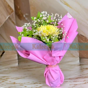 A bouquet featuring a single yellow daisy surrounded by baby's breath.