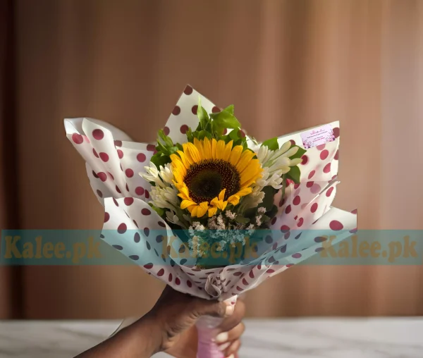 A bouquet of imported sunflowers with statice and tuberose flowers.