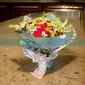 A sophisticated bouquet featuring a mix of various flowers arranged in an elegant design.