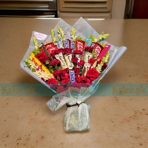 A heavy-loaded bouquet with chocolates, red roses, and tuberose.