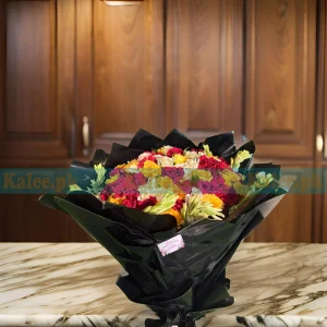 A bouquet of red, white, and yellow roses with tuberose flowers.