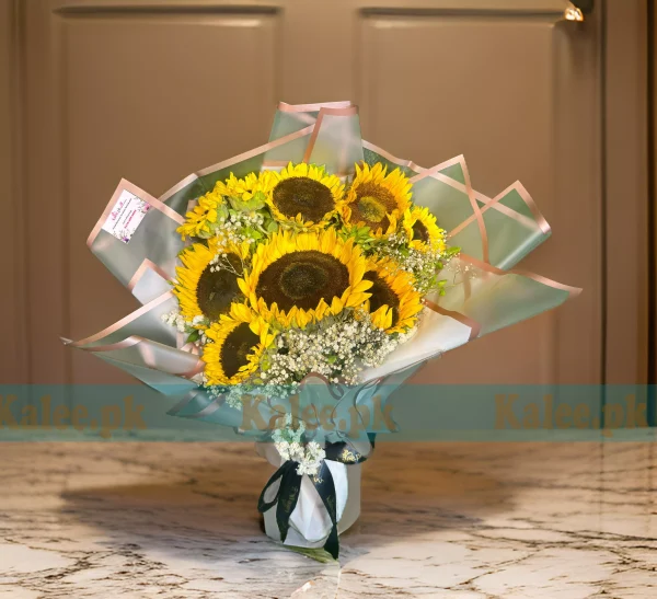 A bouquet of imported sunflowers with baby's breath flowers.