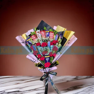 Chocolates Bouquet with statice, tuberose, and red roses, elegantly wrapped with a satin ribbon.