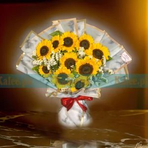 A bouquet featuring statice and Imported Sunflower.