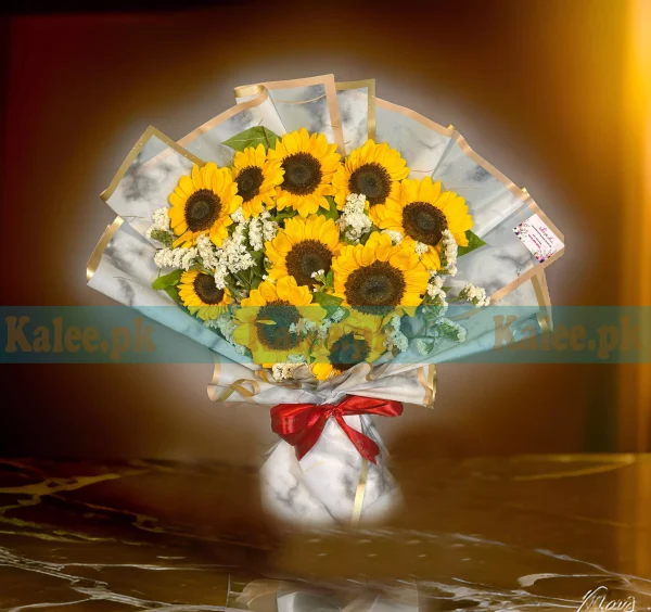 A bouquet featuring statice and imported sunflowers.