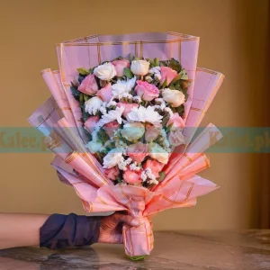 A stunning Statice Flowers Bouquet featuring pink roses, white chrysanthemums, arranged in a chic design.