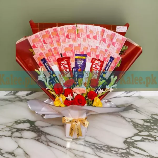 Chocolates and flowers bouquet with 100 rupee new currency notes.