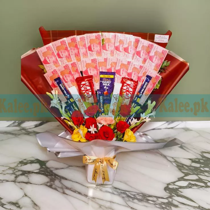 Chocolates and flowers bouquet with 100 rupee new currency notes.