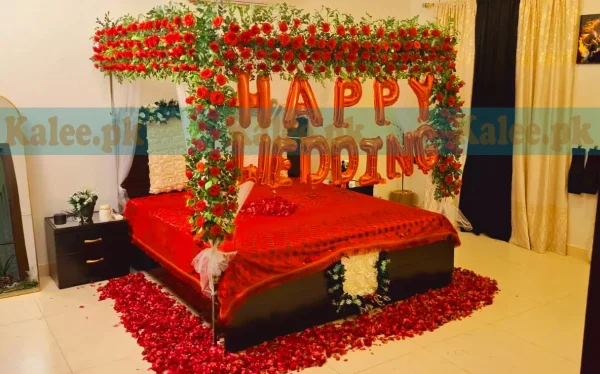 Red rose flowers arranged for a beautiful wedding bridal bedroom decoration.