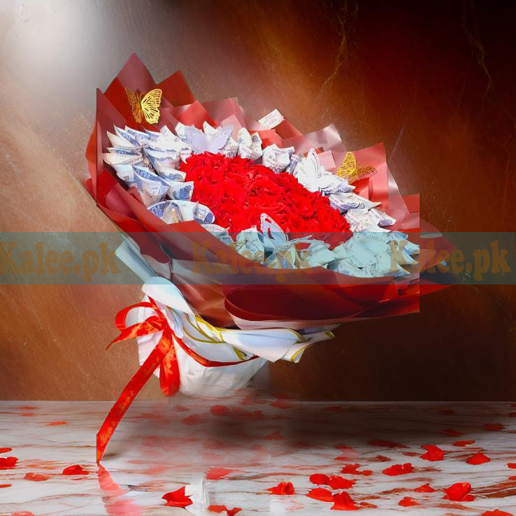 currency note cash bouquet with fresh red roses, wrapped in elegant paper and ribbon.