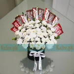 Chocolates Box With White Roses, baby’s breath, Kinder Bueno, KitKat and M&M’s from Kalee.pk Karachi