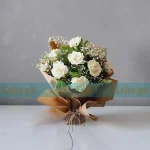 Fresh English White Roses with Baby’s Breath bouquet for weddings and gifting in Karachi