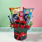 Flowers Box With Chocolates and Lays chips – includes Bounty, KitKat, Snickers, and Dairy Milk – Karachi flower shop Kalee.pk