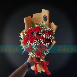 A stunning Red Rose Flower Bouquet elegantly arranged with delicate baby's breath, beautifully wrapped for a timeless gift.
