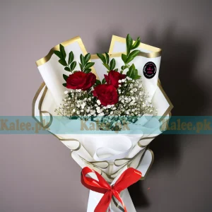 Red Rose Bouquet with fresh red roses and baby’s breath, elegantly wrapped in decorative paper and finished with a satin ribbon.