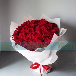 Rose Flowers Bouquet with fresh red roses and greenery, beautifully wrapped for a timeless and romantic floral arrangement.